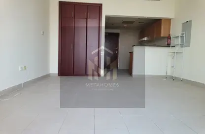 Apartment - Studio - 1 Bathroom for rent in Ice Hockey - Dubai Sports City - Dubai