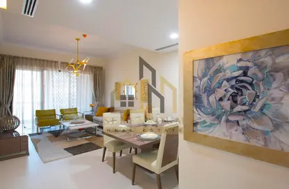 Living / Dining Room image for: Duplex - 3 Bedrooms - 4 Bathrooms for sale in Janayen Avenue - Mirdif Hills - Mirdif - Dubai, Image 1