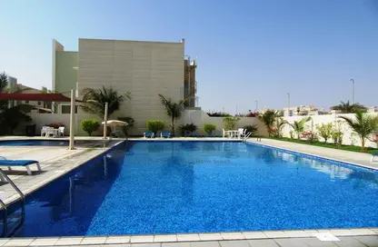 Villa - 4 Bedrooms - 6 Bathrooms for rent in Liwa Oasis compound - Khalifa City - Abu Dhabi