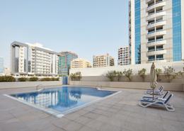 Pool image for: Apartment - 1 bedroom - 2 bathrooms for rent in Emerald Residence - Dubai Silicon Oasis - Dubai, Image 1