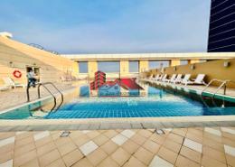 Pool image for: Apartment - 1 bedroom - 2 bathrooms for rent in Dusit Thani - Muroor Area - Abu Dhabi, Image 1