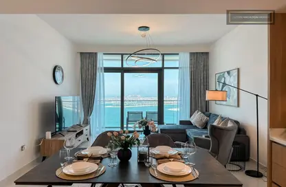 Living / Dining Room image for: Apartment - 2 Bedrooms - 2 Bathrooms for rent in Beach Vista - EMAAR Beachfront - Dubai Harbour - Dubai, Image 1