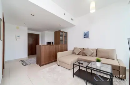 Living Room image for: Apartment - 1 Bedroom - 1 Bathroom for sale in Blakely Tower - Park Island - Dubai Marina - Dubai, Image 1
