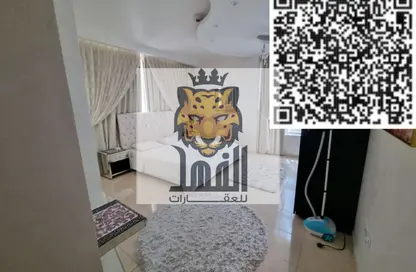 شقة - غرفة نوم - 2 حمامات للايجار في أورينت تاور 1 - أورينت تاور - البستان - عجمان