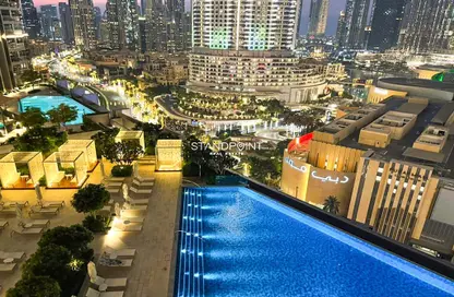 صورة لـ حوض سباحة النزل و الشقق الفندقية - غرفة نوم - 2 حمامات للبيع في دبي وسط المدينة - دبي ، صورة رقم 1