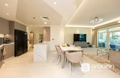Living / Dining Room image for: Apartment - 2 Bedrooms - 3 Bathrooms for sale in Al Khudrawi - Shoreline Apartments - Palm Jumeirah - Dubai, Image 1