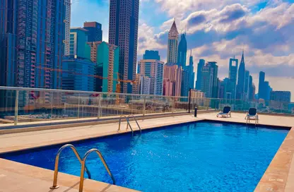 Apartment - 1 Bedroom - 2 Bathrooms for rent in Jumeirah Garden City - Al Satwa - Dubai
