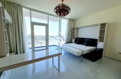 Room / Bedroom image for: Apartment - 1 Bathroom for sale in Miraclz Tower by Danube - Arjan - Dubai, Image 1
