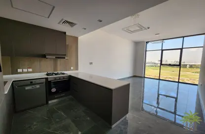 Kitchen image for: Apartment - 2 Bedrooms - 3 Bathrooms for rent in DMS Two - Meydan Avenue - Meydan - Dubai, Image 1