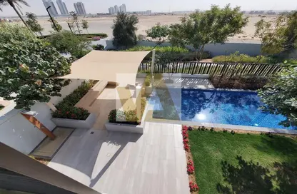 صورة لـ حوض سباحة فيلا - 6 غرف نوم - 7 حمامات للبيع في هارموني - تلال الغاف - دبي ، صورة رقم 1