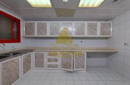 Kitchen image for: Apartment - 2 Bedrooms - 2 Bathrooms for rent in Khalidiya Street - Al Khalidiya - Abu Dhabi, Image 1
