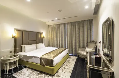 Room / Bedroom image for: Apartment - 1 Bedroom - 2 Bathrooms for rent in Damac Heights - Dubai Marina - Dubai, Image 1