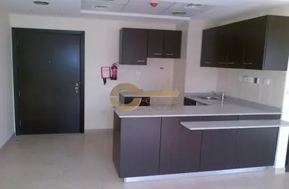 Kitchen image for: Apartment - 1 Bathroom for sale in Al Thamam 26 - Al Thamam - Remraam - Dubai, Image 1