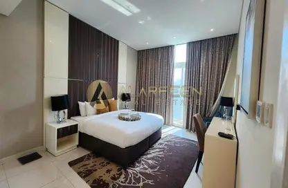 صورة لـ غرفة- غرفة النوم شقة - 2 غرف نوم - 3 حمامات للايجار في بايز ووتر - الخليج التجاري - دبي ، صورة رقم 1