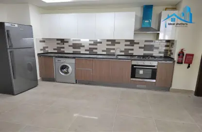 Kitchen image for: Apartment - 2 Bedrooms - 3 Bathrooms for rent in Azizi Star - Al Furjan - Dubai, Image 1