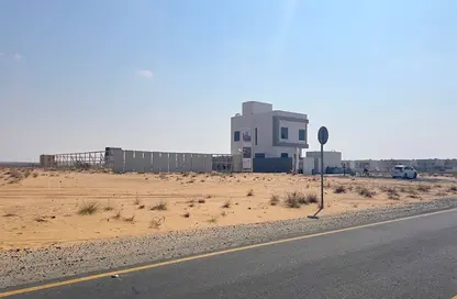 أرض - استوديو للبيع في روضة القرط - ضاحية الروضات - الشارقة