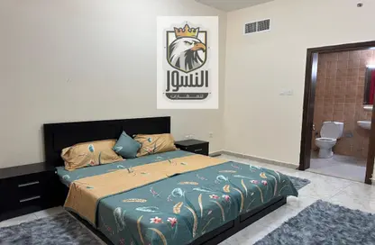 Room / Bedroom image for: Apartment - 1 Bedroom - 2 Bathrooms for rent in Ajman Twins - Al Nuaimiya - Ajman, Image 1
