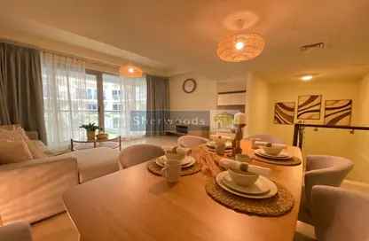 Living / Dining Room image for: Apartment - 2 Bedrooms - 3 Bathrooms for sale in Pacific Tonga - Pacific - Al Marjan Island - Ras Al Khaimah, Image 1