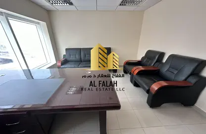 Living Room image for: Office Space - Studio - 1 Bathroom for rent in Al Majaz 3 - Al Majaz - Sharjah, Image 1