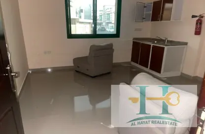 Living Room image for: Apartment - 1 Bathroom for rent in Al Naemiya Tower 1 - Al Naemiya Towers - Al Nuaimiya - Ajman, Image 1