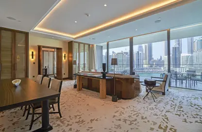 Living / Dining Room image for: Apartment - 2 Bedrooms - 3 Bathrooms for sale in Dorchester Collection Dubai - Business Bay - Dubai, Image 1