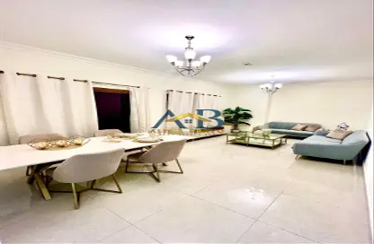 Living / Dining Room image for: Apartment - 1 Bedroom - 2 Bathrooms for sale in Rokane G24 - Al Warsan 4 - Al Warsan - Dubai, Image 1