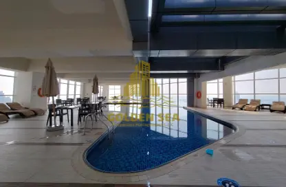 صورة لـ حوض سباحة شقة - 2 غرف نوم - 3 حمامات للايجار في الجيمي أفينو - الخالدية - أبوظبي ، صورة رقم 1