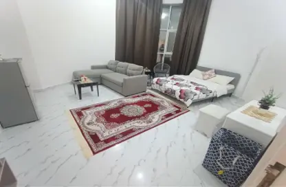 Living Room image for: Apartment - 1 Bathroom for rent in Mohammed Villas 24 - Mohamed Bin Zayed City - Abu Dhabi, Image 1