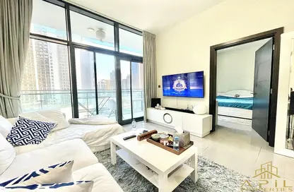 Living Room image for: Apartment - 1 Bedroom - 2 Bathrooms for sale in Merano Tower - Business Bay - Dubai, Image 1