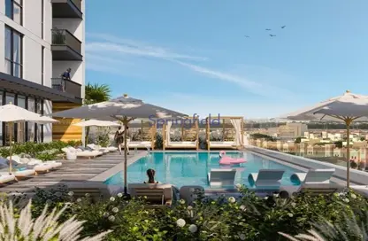 Pool image for: Apartment - 1 Bedroom - 2 Bathrooms for sale in The Portman - Jumeirah Village Circle - Dubai, Image 1