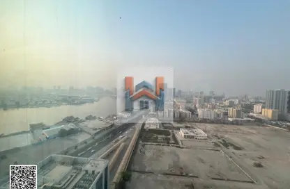 شقة - غرفة نوم - 2 حمامات للايجار في أورينت تاور 1 - أورينت تاور - البستان - عجمان