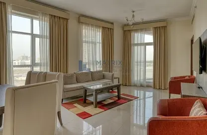 Living / Dining Room image for: Apartment - 3 Bedrooms - 4 Bathrooms for sale in Siraj Tower - Arjan - Dubai, Image 1