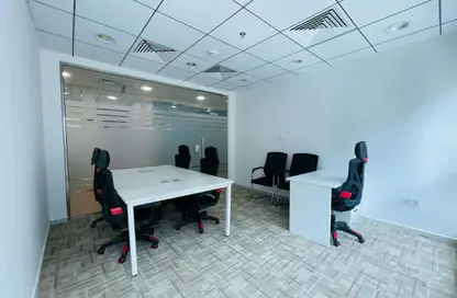 Office Space - Studio - 4 Bathrooms for rent in Hamdan Street - Abu Dhabi