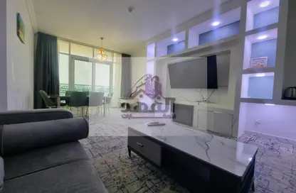 Living / Dining Room image for: Apartment - 2 Bedrooms - 3 Bathrooms for rent in Oasis Tower - Al Rashidiya 1 - Al Rashidiya - Ajman, Image 1