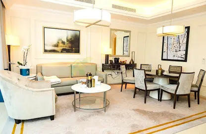 Living / Dining Room image for: Apartment - 2 Bedrooms - 3 Bathrooms for rent in Kempinski BLVD - Downtown Dubai - Dubai, Image 1