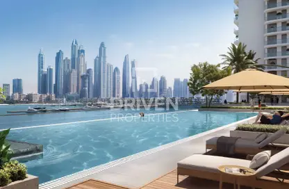 Pool image for: Apartment - 4 Bedrooms - 5 Bathrooms for sale in Palace Beach Residence - EMAAR Beachfront - Dubai Harbour - Dubai, Image 1