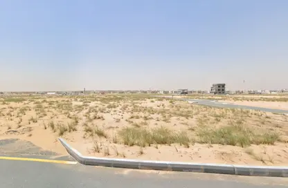 أرض - استوديو للبيع في روضة القرط - ضاحية الروضات - الشارقة