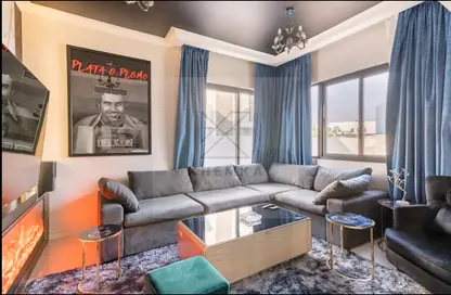 Living Room image for: Townhouse - 3 Bedrooms - 4 Bathrooms for sale in Aurum Villas - Coursetia - Damac Hills 2 - Dubai, Image 1