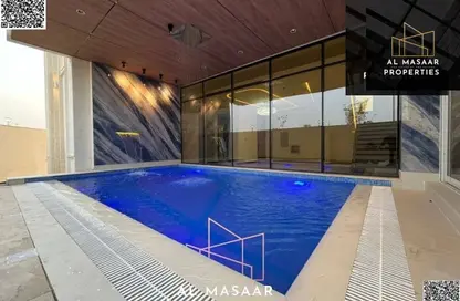 Villa - 5 Bedrooms - 7 Bathrooms for sale in Al Helio 2 - Al Helio - Ajman