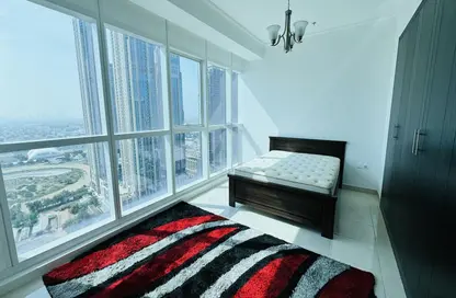 Room / Bedroom image for: Apartment - 1 Bedroom - 2 Bathrooms for rent in The Court Tower - Business Bay - Dubai, Image 1