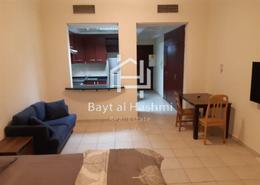 صورةغرفة المعيشة / غرفة الطعام لـ: Studio - 1 حمام للكراء في بناية  38إلى107 - طراز البحر المتوسط - ديسكوفري غاردنز - دبي, صورة 1