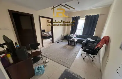 Living Room image for: Apartment - 1 Bedroom - 2 Bathrooms for sale in Jasmine Towers - Garden City - Ajman, Image 1
