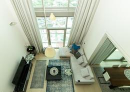 Living Room image for: Duplex - 2 bedrooms - 3 bathrooms for sale in Liberty House - DIFC - Dubai, Image 1
