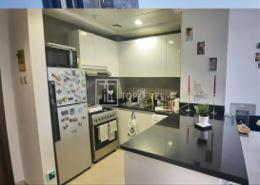 صورةمطبخ لـ: شقة - 1 غرفة نوم - 2 حمامات للبيع في شقق المدينة - قرية الجميرا سركل - دبي, صورة 1
