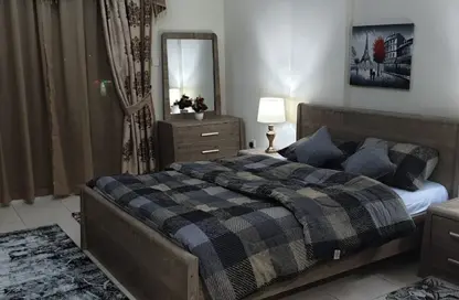 شقة - 1 حمام للايجار في اي سي 1 اماراتي 11 - طراز إماراتي - المدينة الدولية - دبي