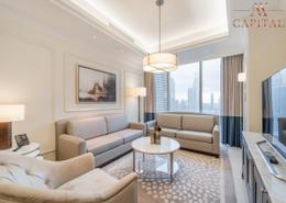 صورةغرفة المعيشة لـ: شقة - 1 غرفة نوم - 2 حمامات للكراء في فندق العنوان - بوليفارد - دبي وسط المدينة - دبي, صورة 1
