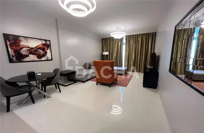Living / Dining Room image for: Apartment - 1 Bedroom - 2 Bathrooms for sale in Artesia C - Artesia - DAMAC Hills - Dubai, Image 1