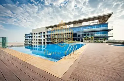 Pool image for: Apartment - 1 Bathroom for sale in Park View - Saadiyat Island - Abu Dhabi, Image 1