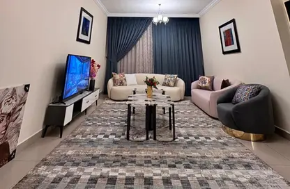 شقة - غرفة نوم - 2 حمامات للايجار في برج منازل 5 - شارع التعاون - التعاون - الشارقة