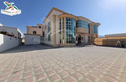 Outdoor House image for: Villa - 5 Bedrooms - 7 Bathrooms for rent in Shi'bat Al Wutah - Al Ain, Image 1